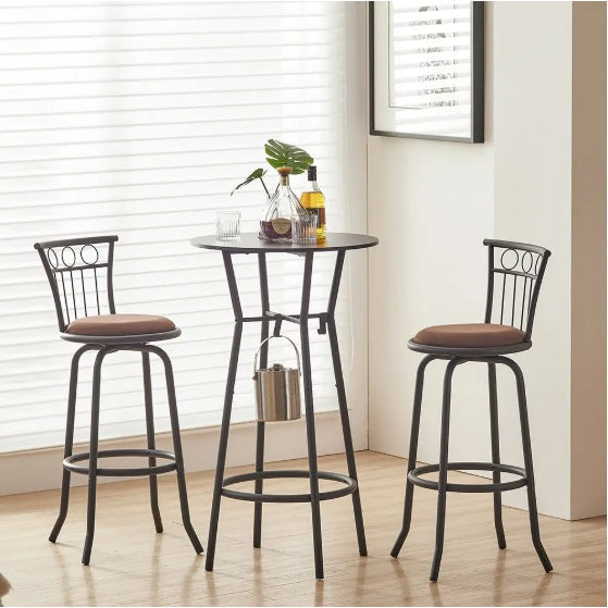 A 3-piece bar table set with a round wood tabletop and matte black metal frames, including two bar stools with beige cushions.