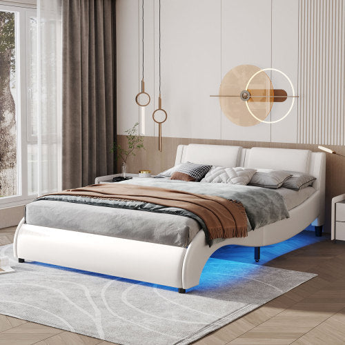 White upholstered platform bed in a clean minimalist bedroom