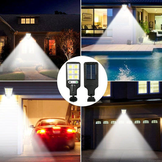 Solar motion sensor light mounted on a home exterior near an outdoor approach