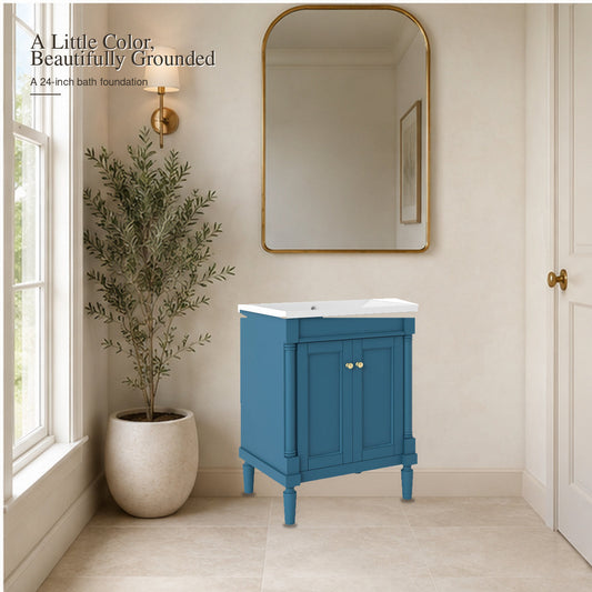 Blue 24-inch bathroom vanity with white sink top in a warm modern bathroom