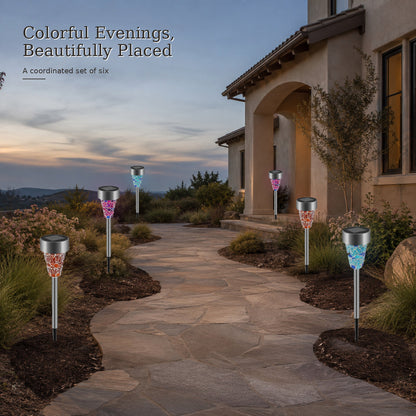 Solar courtyard stake lights set of six in a colorful evening garden