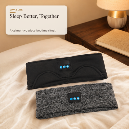 Two wearable sleep support headbands are displayed on a bed in a bedroom setting. The top headband is black and the bottom is heather gray, both with a small control panel on the front.