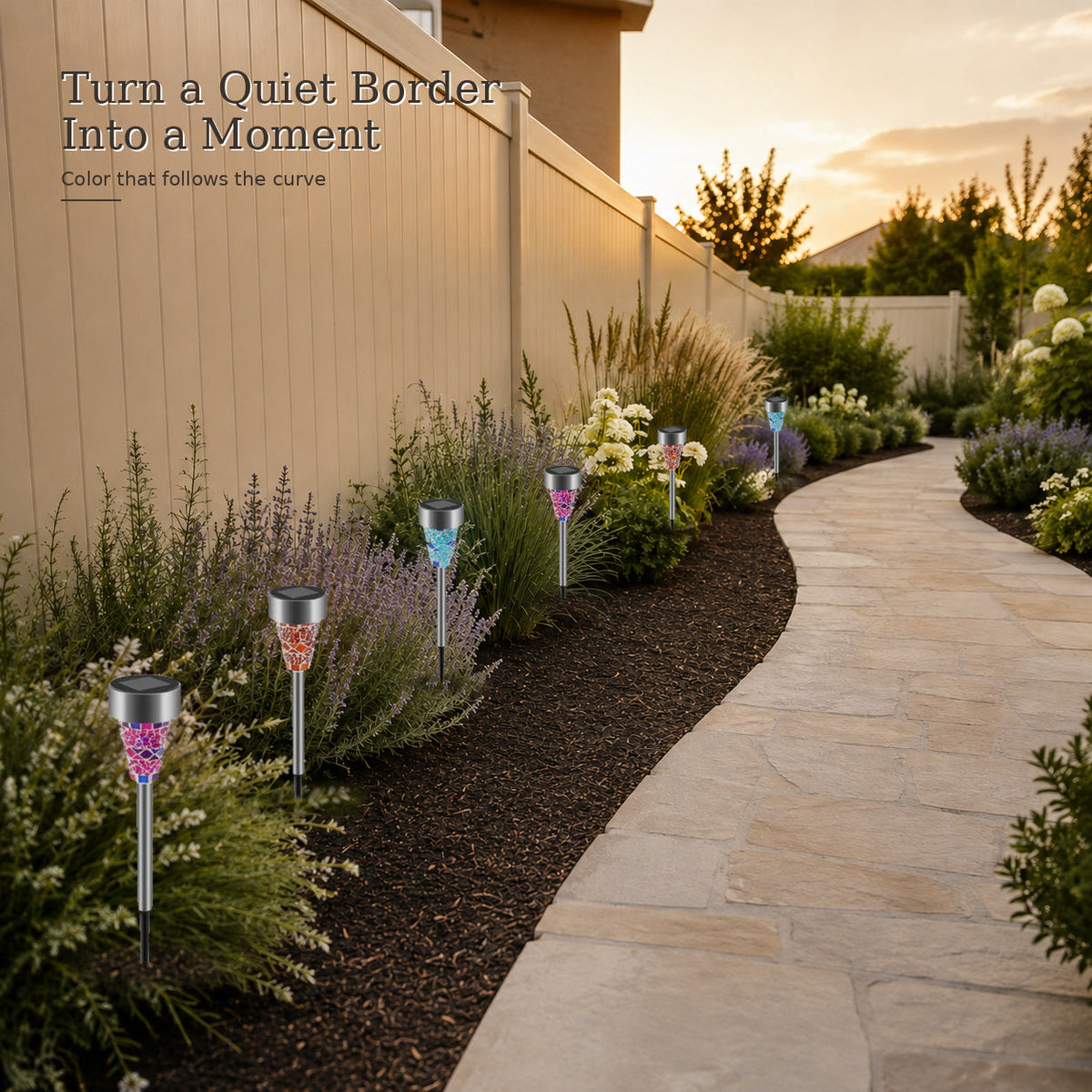 Colorful solar stake lights arranged along a landscaped garden border