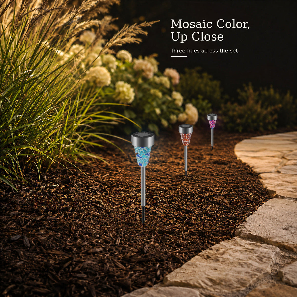 Close-up of colorful mosaic solar courtyard stake light design