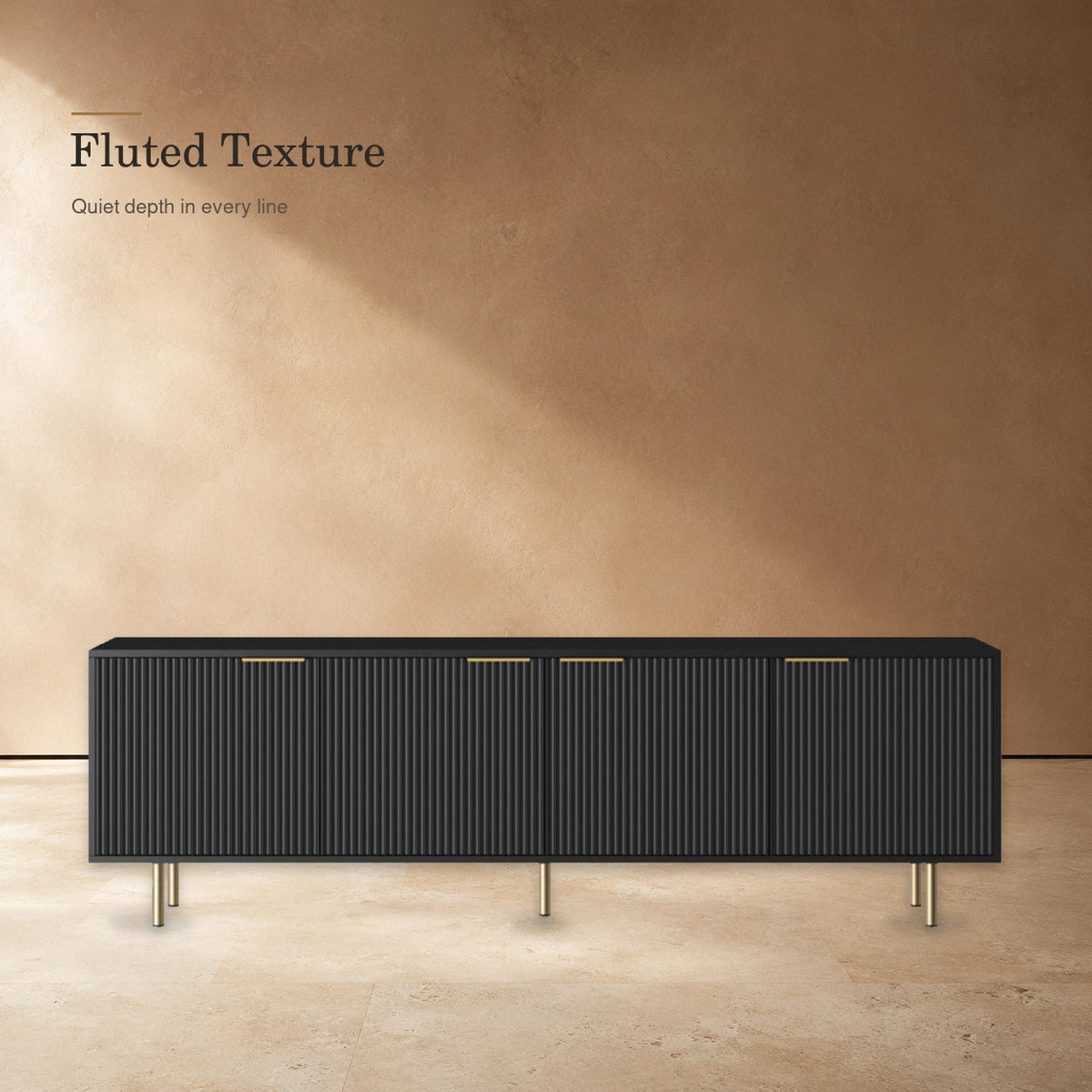 Black TV stand highlighting fluted door texture and gold-tone accents