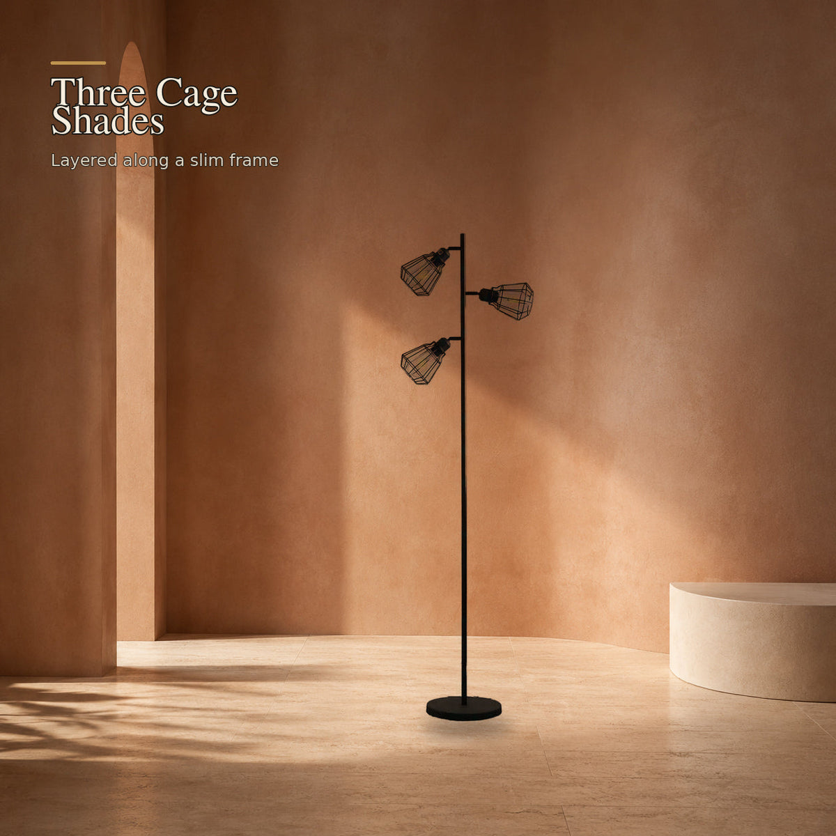 Matte black floor lamp with three staggered open cage shades