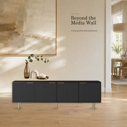Black fluted console styled as a low-profile storage cabinet