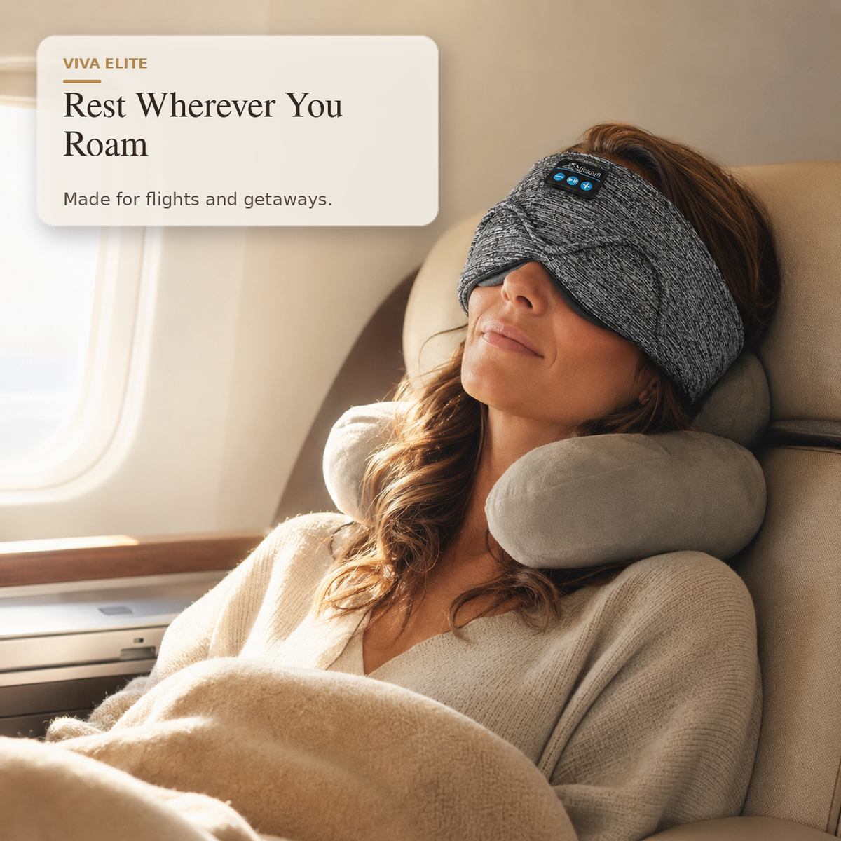 A woman reclining on an airplane seat with a gray knit sleep mask and matching neck pillow, with a text overlay reading 'VIVA ELITE Rest Wherever You Roam Made for flights and getaways.'.