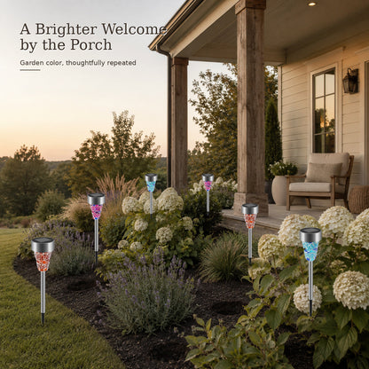 Solar courtyard stake lights creating a welcoming porch garden