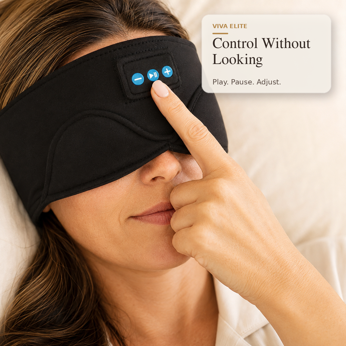 A woman wearing a black sleep mask with built-in control buttons on the forehead, with her finger touching the buttons. A text box in the upper right reads 'VIVA ELITE Control Without Looking.