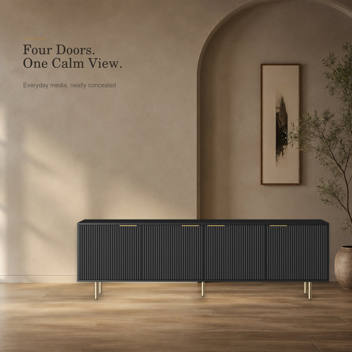 Four-door black fluted TV stand in a warm architectural interior