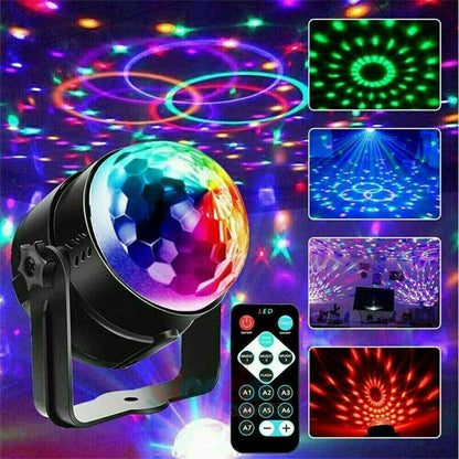 Colorful disco ball with remote control on a dark background