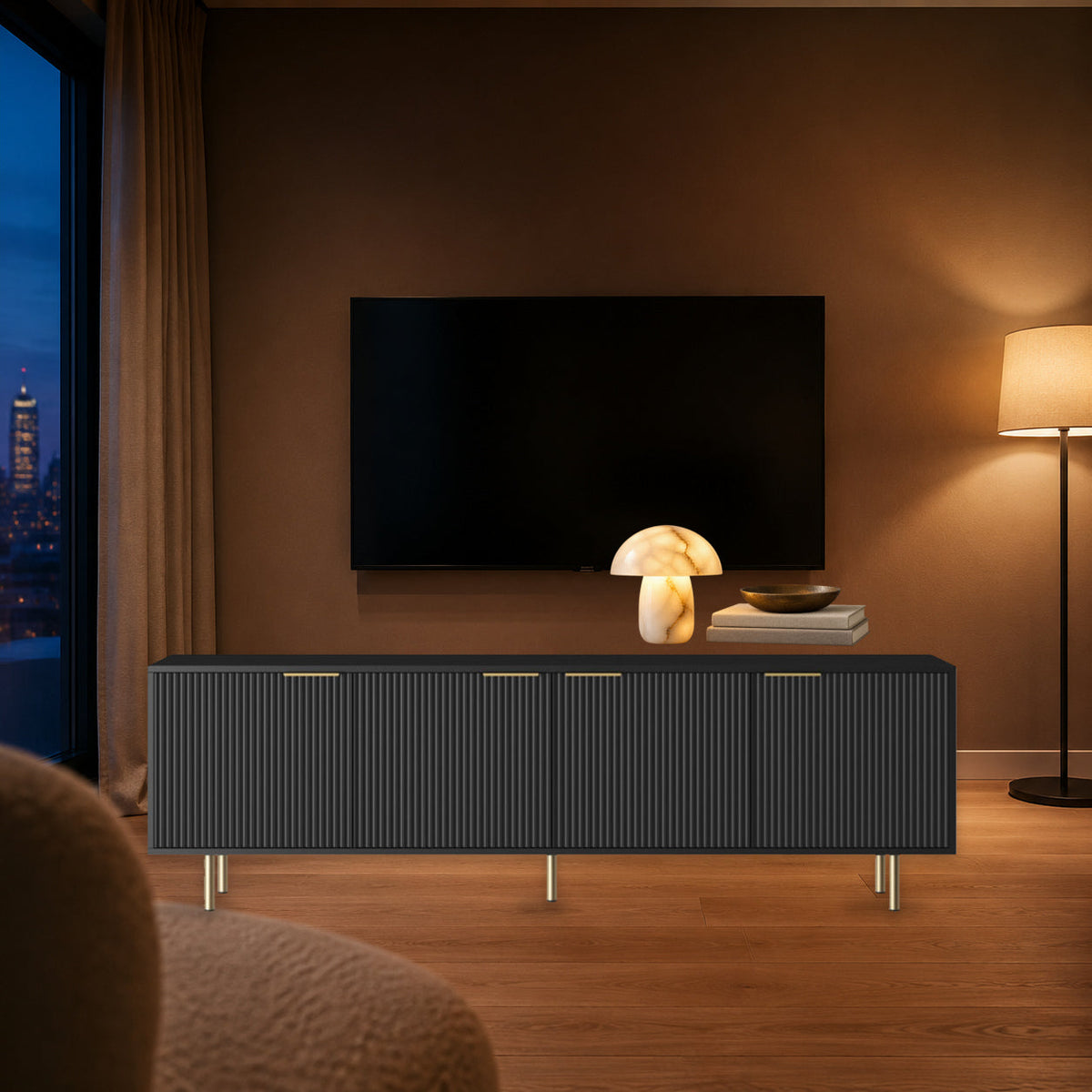 Black fluted media console in an elegant evening living room