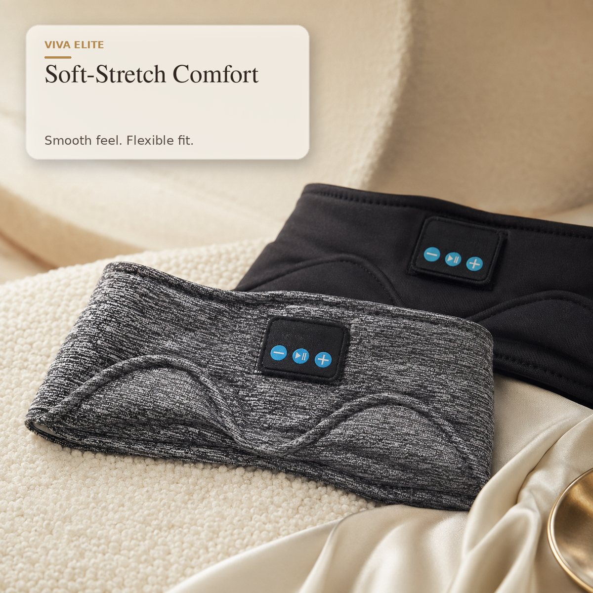 Two soft-stretch neck warmers shown on draped fabric: one heather gray in front with a black control panel, and one black in back with a matching control panel. Text in the upper left reads 'VIVA ELITE Soft-Stretch Comfort' with 'Smooth feel.