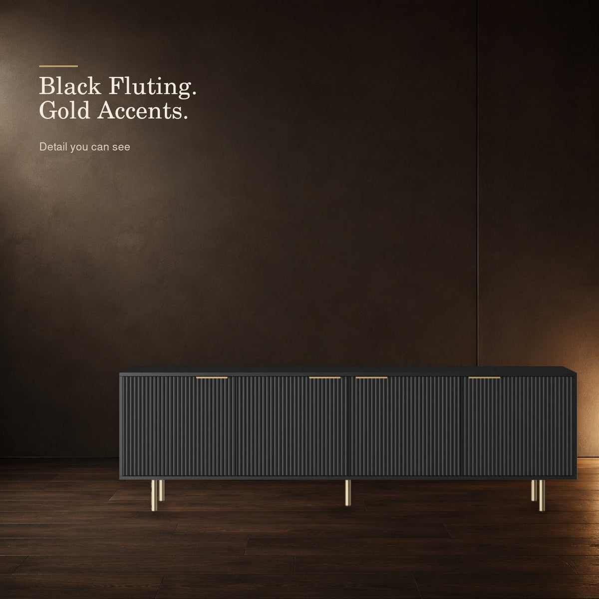 Black fluted TV stand with refined gold-tone handles and legs