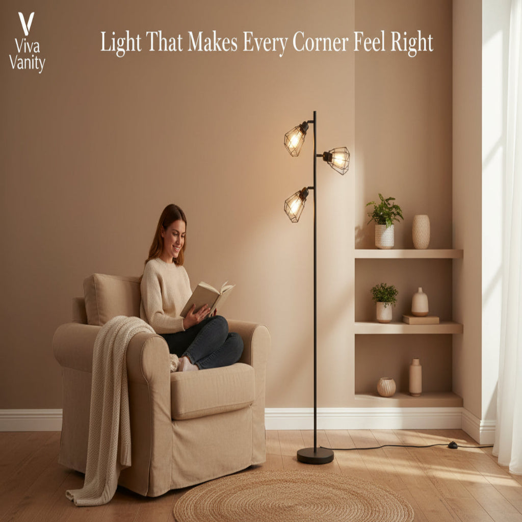 Woman reading a book in a cozy living room with a floor lamp and shelves.