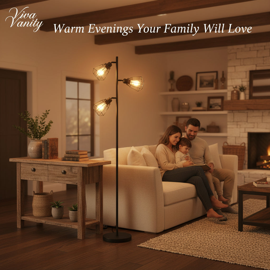 Modern floor lamp with three glass shades in a living room setting with two gray armchairs and a framed picture on the wall.