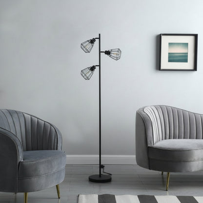 Modern living room with a floor lamp between two gray chairs and a framed picture on the wall.
