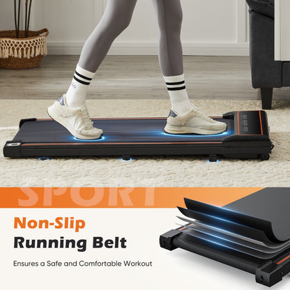 Person using a treadmill with a focus on the non-slip running belt feature.