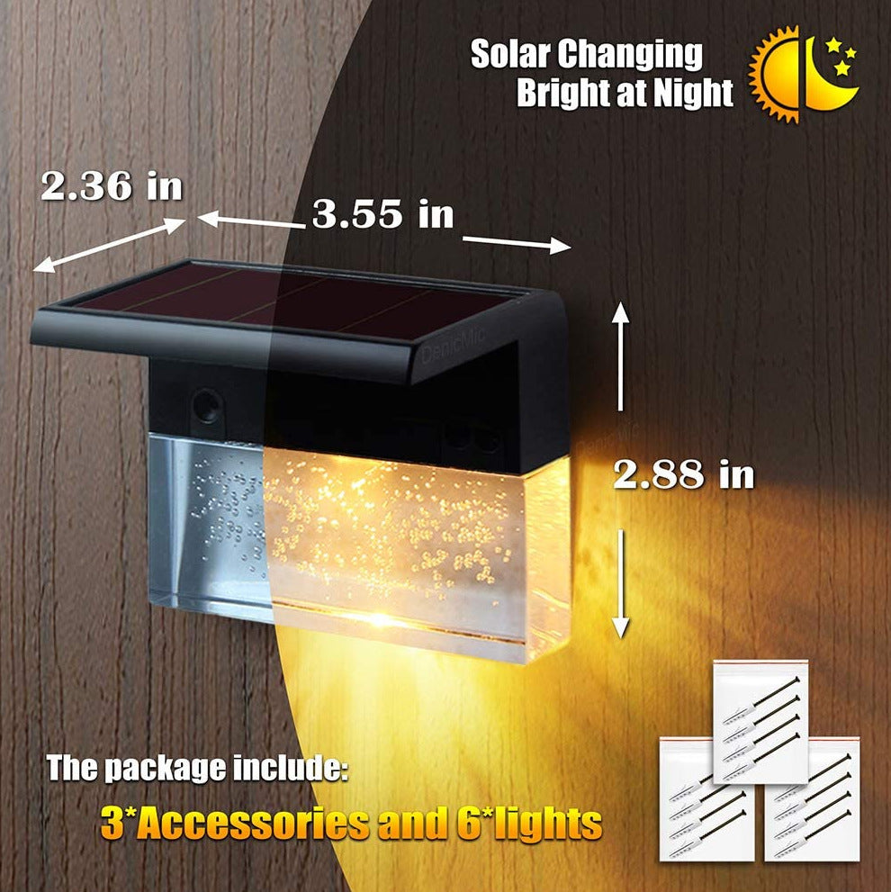 Solar-powered outdoor light with dimensions and features highlighted on a wooden background