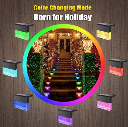 Color-changing outdoor lights with a festive scene on a wooden background