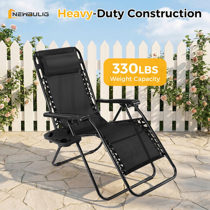 Black lounge chair with 'Heavy-Duty Construction' and '330LBS Weight Capacity' label on a patio background.