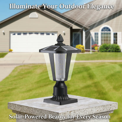 A black solar-powered pillar headlight with dimmable LEDs installed on a post outdoors, with a house in the background.