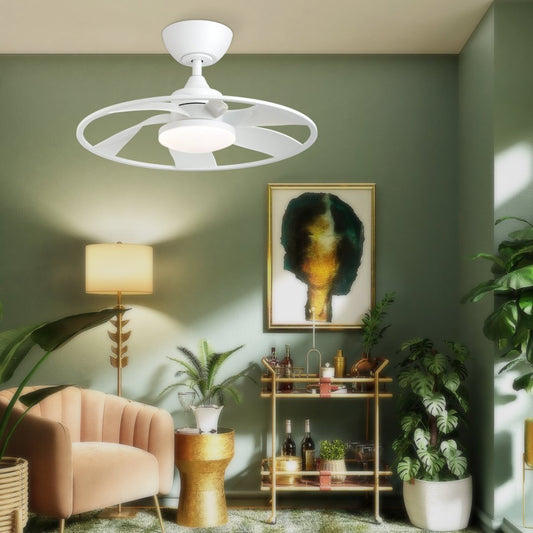 A matte white smart ceiling fan with LED light, installed in a modern room with green walls, a leather sofa, and a variety of decorations.