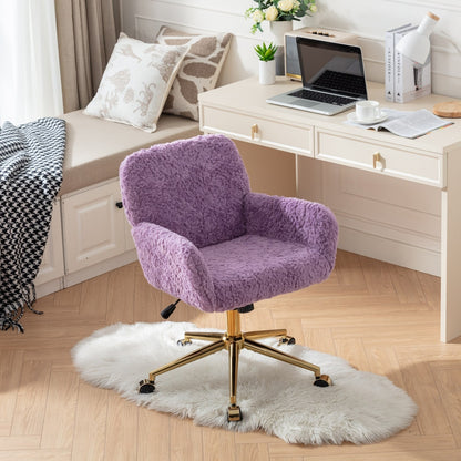 A purple faux fur office chair with a gold metal base and caster wheels, placed in a home office setting.