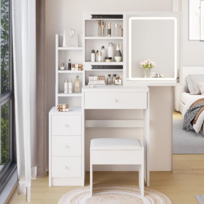 A modern white vanity table with a smart LED mirror, integrated cabinet, and a cushioned stool. The room setting includes a bedroom environment with the vanity as a central piece.
