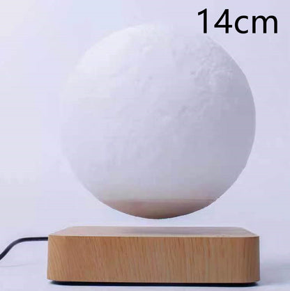 A 3D printed white moon lamp levitating above a wooden base, with a touch sensor on the side.