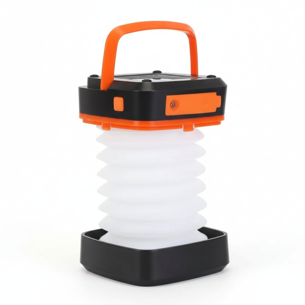 Collapsible lantern with orange handle and accents on a white background