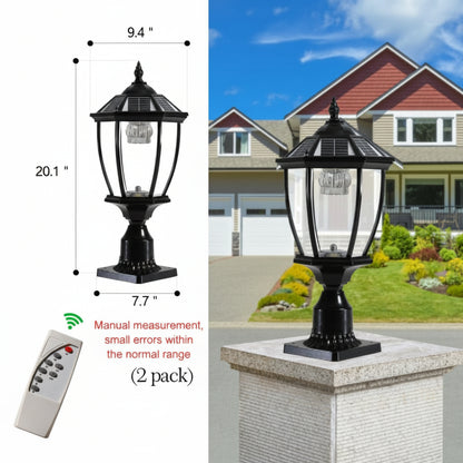 Black outdoor solar lamp with dimensions and remote control, placed on a pedestal with a house in the background.