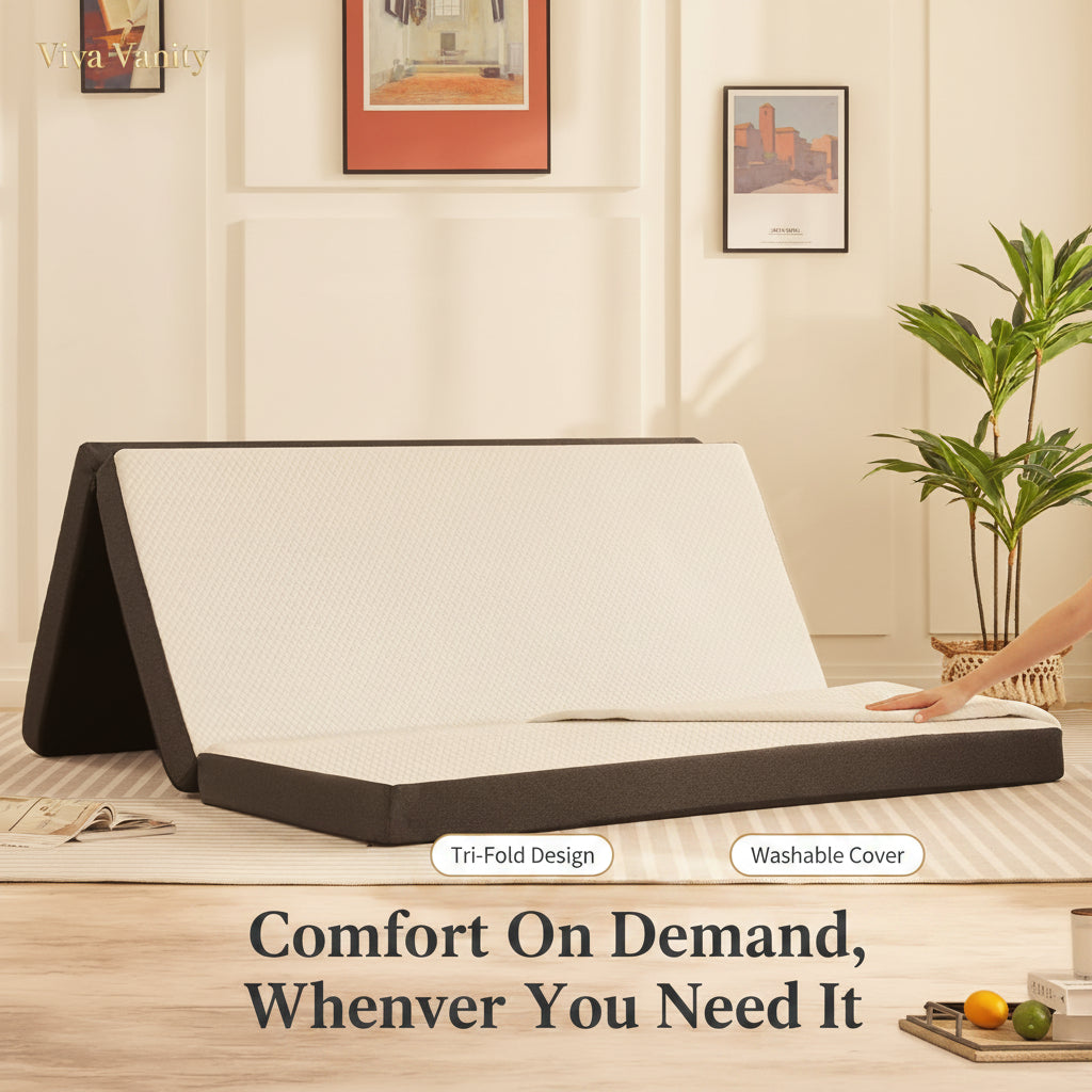 Foldable bed in a room with a plant and framed pictures on the wall.