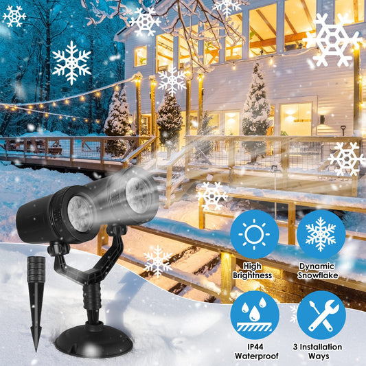 Outdoor Christmas light projector with snowflake effects on a snowy landscape.