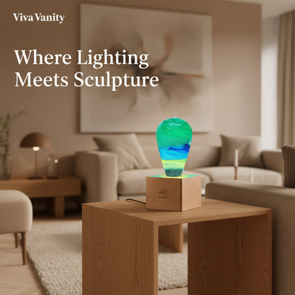 Colorful glass sculpture on a wooden base with a dark background