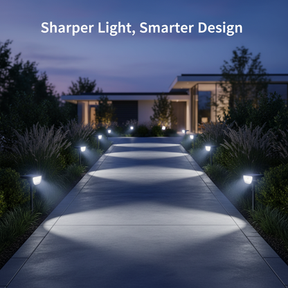 Two black outdoor solar lights with clear lenses on a white background