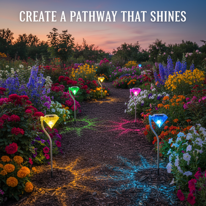 Four colorful diamond-shaped solar lights on stakes with a white background