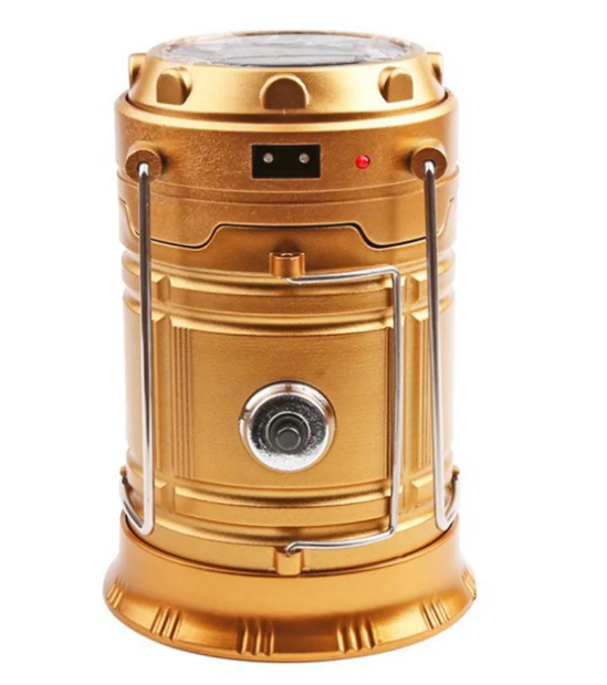 Gold camping lantern with a white background