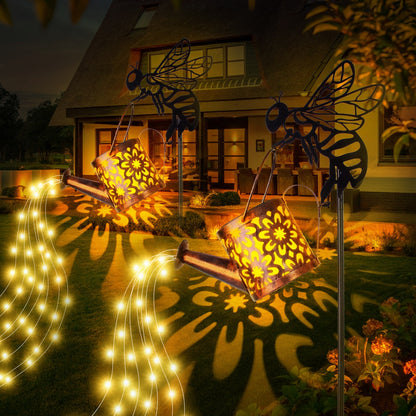 Decorative outdoor lights casting patterns on a house exterior