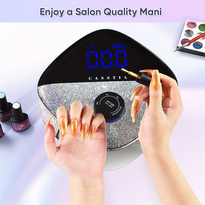 A rechargeable UV lamp for nails with a stylish black and silver design, featuring digital display and adorned with crystals around the edge 3