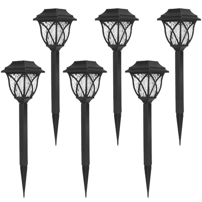 Set of six black solar garden lights on a white background