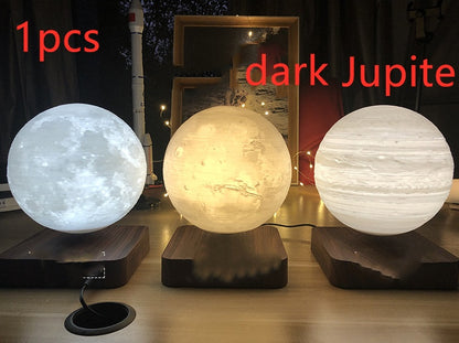 A 3D printed white moon lamp levitating above a wooden base, with a touch sensor on the side 2