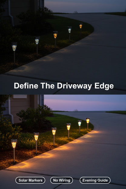 Decorative solar lawn lights in a garden setting with colorful shell designs.