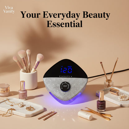 CASSTIA UV/LED nail lamp with digital display and rhinestone design on a white background