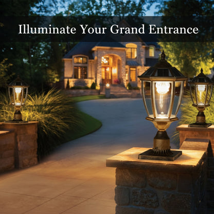 Decorative outdoor lamps illuminating a driveway leading to a house at night.