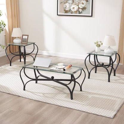 A 3-piece tempered glass coffee table set with black metal frames on a white carpet, featuring a coffee table and two end tables placed on a white rug.