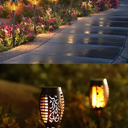 Decorative outdoor lights on a garden path with close-up of light bulb.