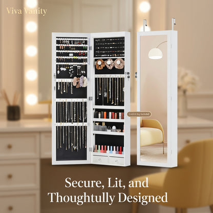 White jewelry armoire with mirror door displaying various jewelry items.