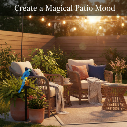 Two solar-powered parrot figurines on stands against a white background